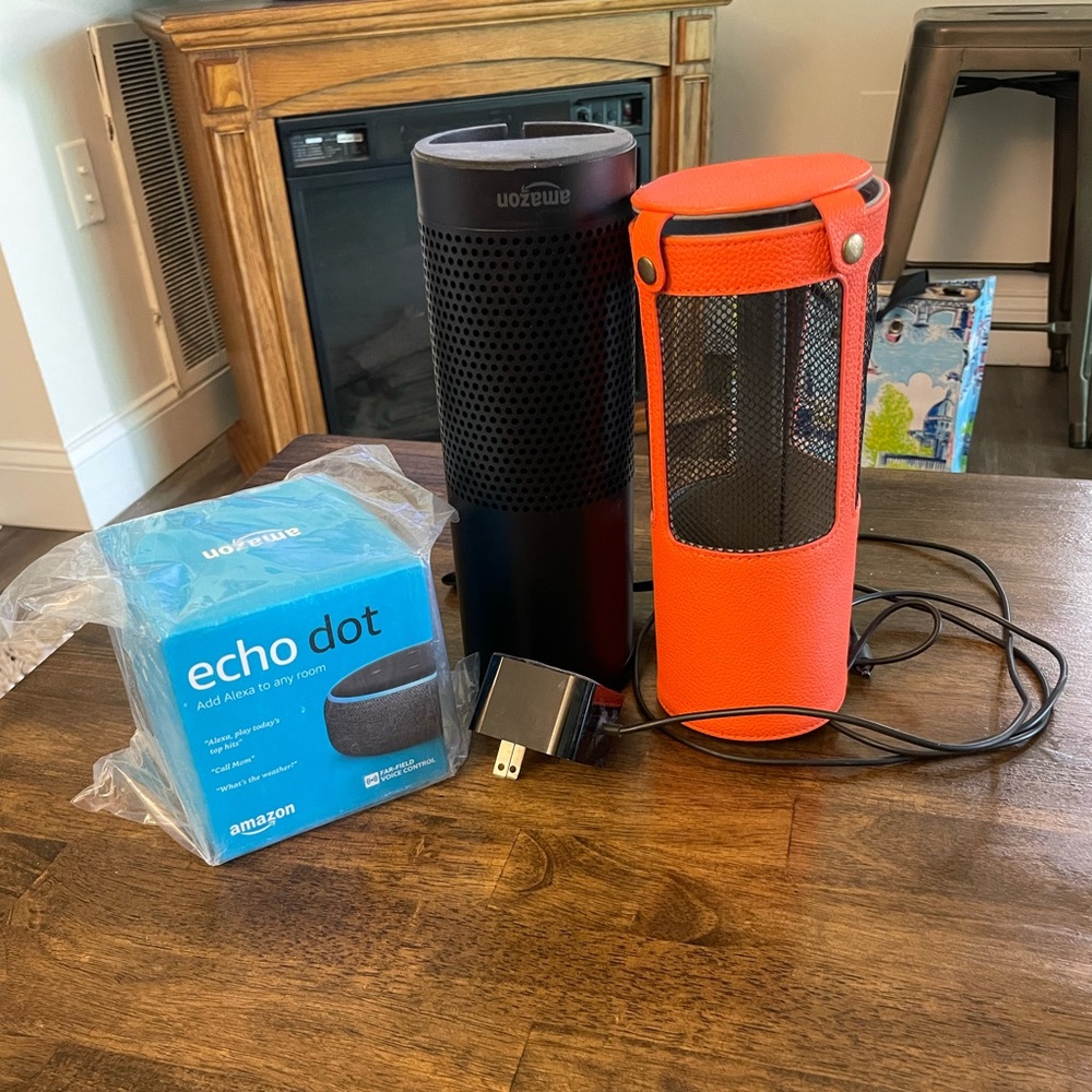 Amazon Alexa, Amazon dot (new in box), charger and Alexa case!